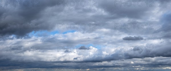Wallpaper for sky replacement, blue sky with dramatic stormy clouds