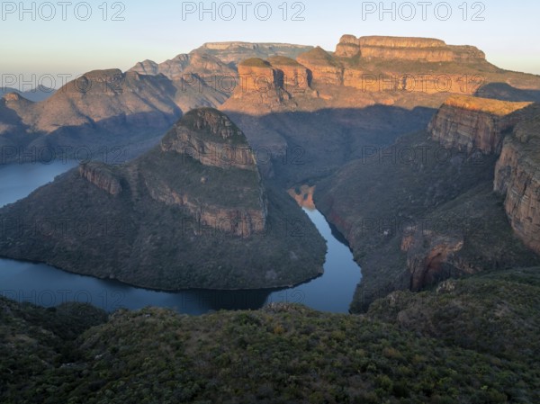 Sunset at Blyde River Canyon with Three Rondawels peak, view of canyon with Blyde River and table