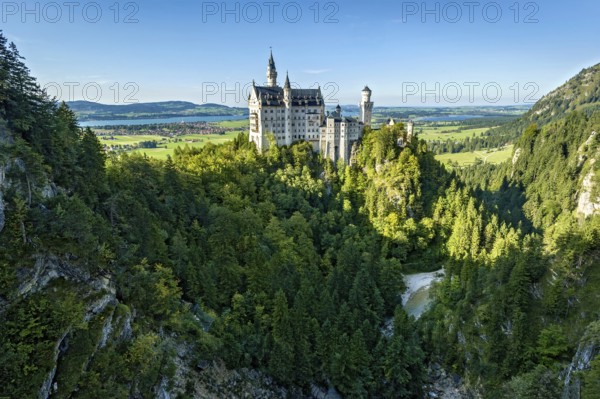 Neuschwanstein Castle by King Ludwig II above the Pöllat Gorge, fairytale castle in the
