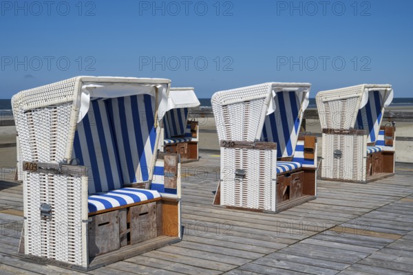 Beach chairs on wooden planks, Sankt Peter Ording, Eiderstedt, North Frisia, North Sea,