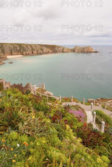 Minack Theatre, spectacular open-air theatre, circular path with lush planting, South England