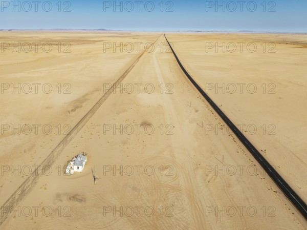 The long abandoned Garum train station and the B4 tarred road in the southern Namib Desert. Aerial