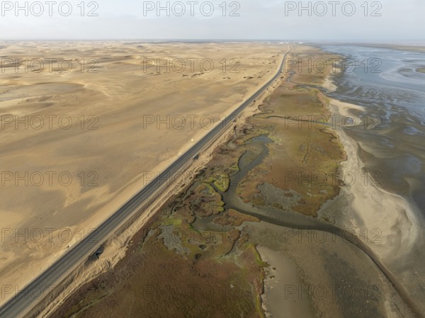 The Walvis Bay Lagoon between Namib Desert and Atlantic Ocean at low tide. Aerial view. Drone shot.