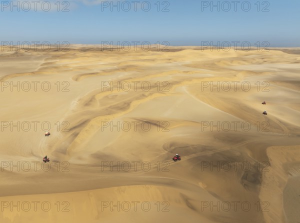 Quad bikes in the dunes of the Namib Desert in the vicinity of the coastal town of Swakopmund.