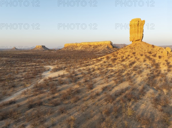 The Vingerklip (rock finger) and the Ugab Valley Terraces are surrounded by thornbush and mopane