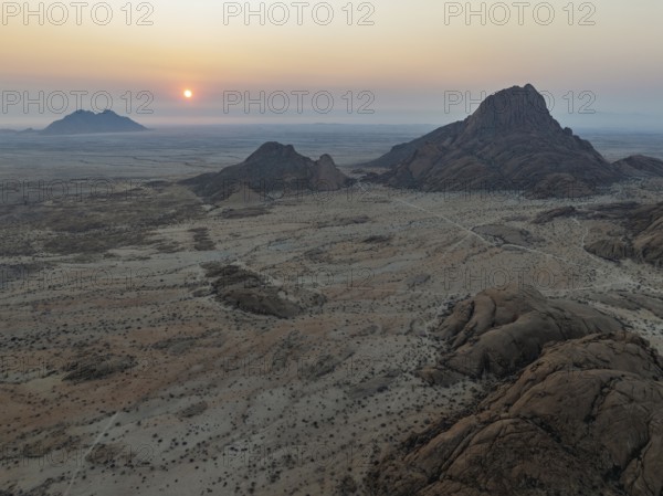 The isolated Spitzkoppe mountain (1728 m) - on the right - majestically rises above the surrounding