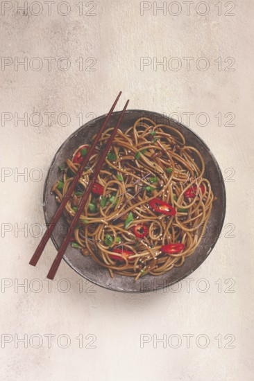 Udon noodles, with shimeji mushrooms, vegetables, in sauce, with sesame seeds, green onions, Asian