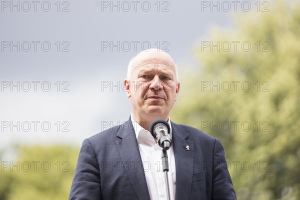 Kai Wegner (Governing Mayor of Berlin) gives a speech in front of the raising of the rainbow flag