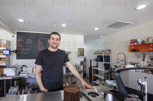 Midland, Michigan - Mohamed Miakiiev, one of the four Ukrainian refugees who own the popular Chef