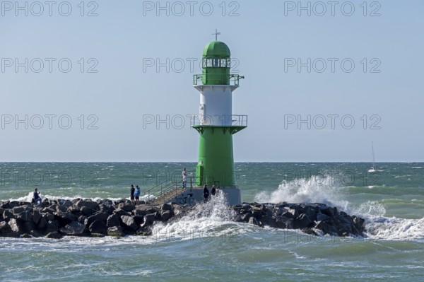 Waves, spray, people, beacon, Warnow estuary, Warnemünde, Rostock, Mecklenburg-Western Pomerania,