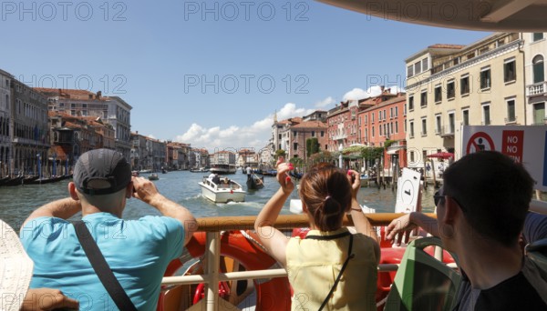 View from the vaporetto onto the Grand Canal, Venice, Veneto, Italy