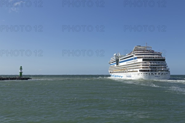 Cruise ship AIDA nova leaving, lighthouse, Warnow estuary, Warnemünde, Rostock, Mecklenburg-Western