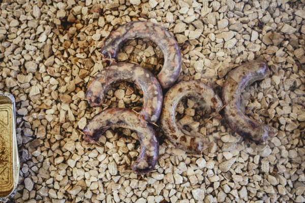 Traditional camel restaurant in Salalah, camel sausages on the grill, Dhofar, Oman