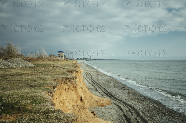 Beach and view of the city. The higher building is the 16-florr-building, as locals call it.