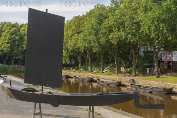 Historic peat harbour with peat barge, mooring, peat as heating material, transport from nearby