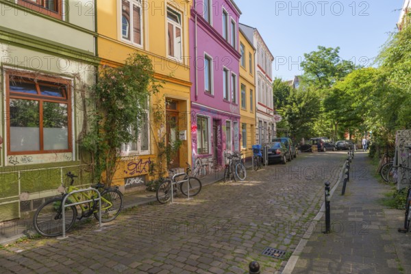 Colourful residential street in the Ostertor quarter a popular residential area, eastern suburb,