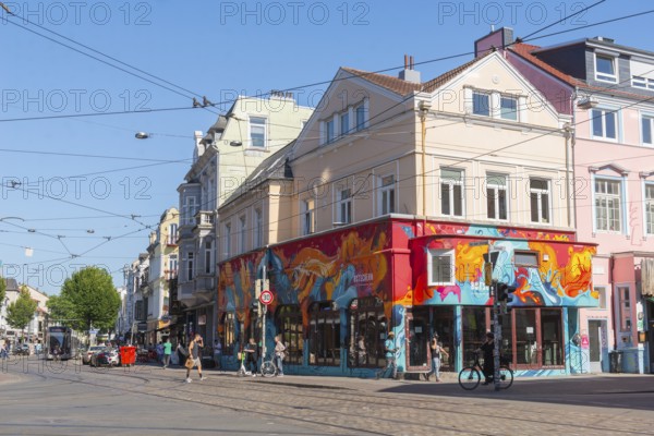Ostertorsteinweg shopping street in the Ostertor district, car traffic, tram, bicycles, wide