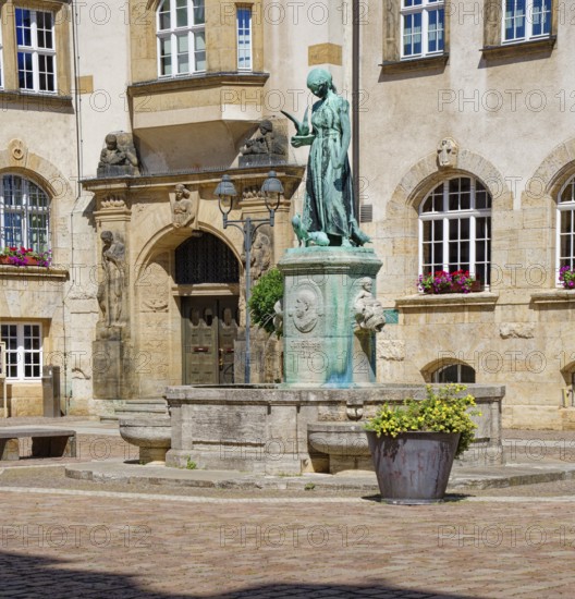Schlegelbrunnen fountain by sculptor Johannes Hartmann in front of the town hall on Döbeln's