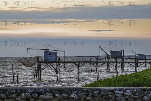 Sunset over Fishing huts over Randonnee entre Histoire et Nature, Fouras, Fouras-les-Bains,