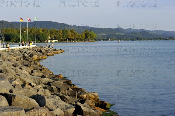 Quay with breakwater made of boulders, Bolsena marina, Porto Turistico di Bolsena, Lake Bolsena,