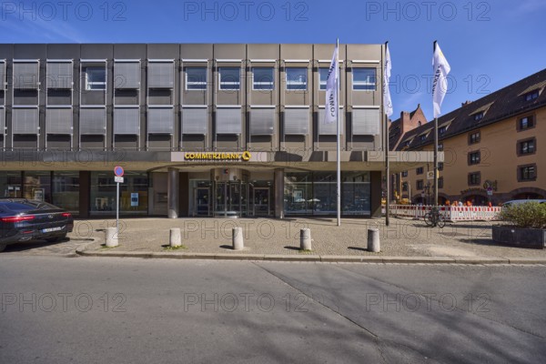 Commerzbank, modern architecture, flags, flagpoles, entrance area, barrier bollards, parking lane,