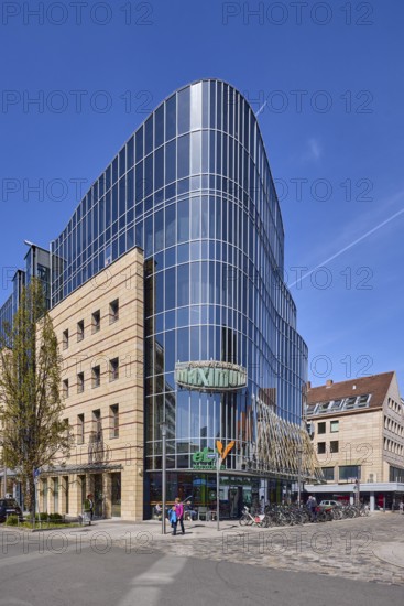 Maximum retail park, modern architecture, glass facade, blue sky, cirrostratus clouds, square,