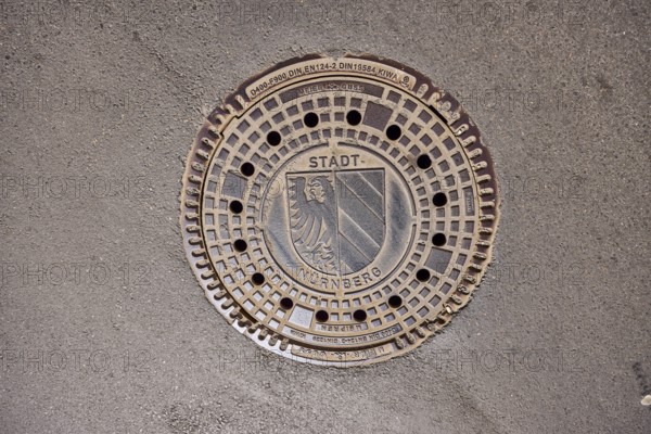 Manhole cover, city coat of arms, drainage, asphalt, road, Nuremberg, Middle Franconia, independent