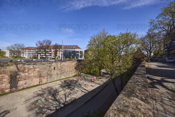 Old town, city fortification, city wall, modern architecture, general development, trees, skate