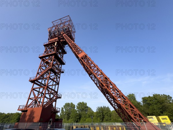 Historic red headframe historic red winding tower of Bonifacius colliery coal mine in mining region