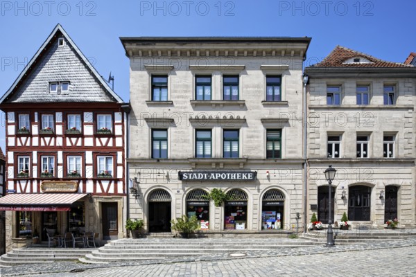 Beautiful row of houses, from left, residential building, half-timbered building, commercial