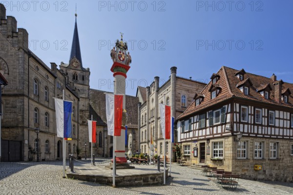 From left Catholic parish centre St. Johannes Catholic church St. Johannes 14th century, column of