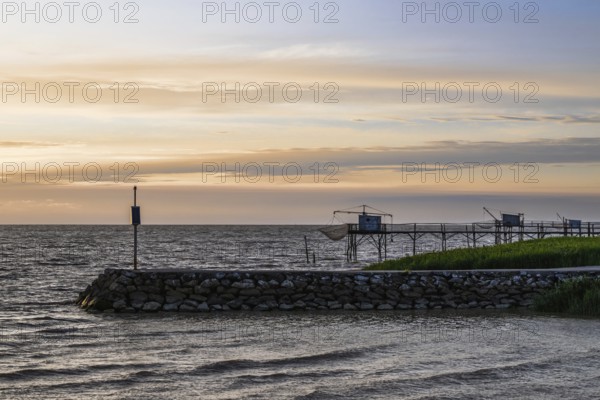 Sunset over Fishing huts over Randonnee entre Histoire et Nature, Fouras, Fouras-les-Bains,