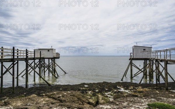Fishing huts over Randonnee entre Histoire et Nature from a drone, Fouras, Fouras-les-Bains,