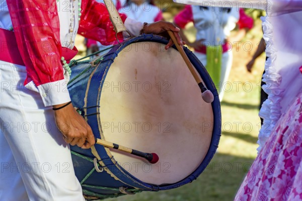 Drums and colorful clothes at the typical religious festival of Congado in a quilombo in Minas