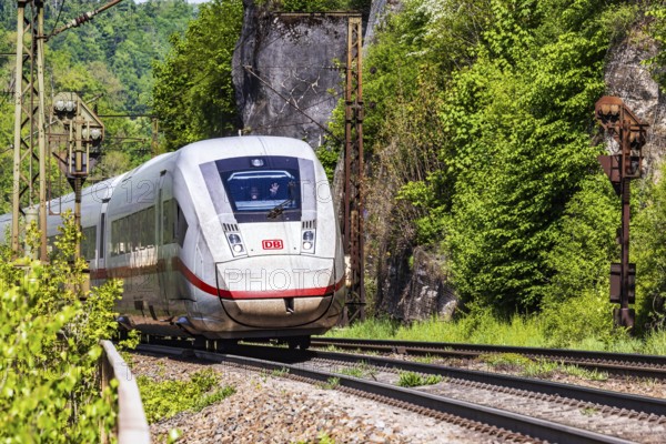 InterCityExpress ICE en route on the winding railway line of the Geislinger Steige. Landscape on