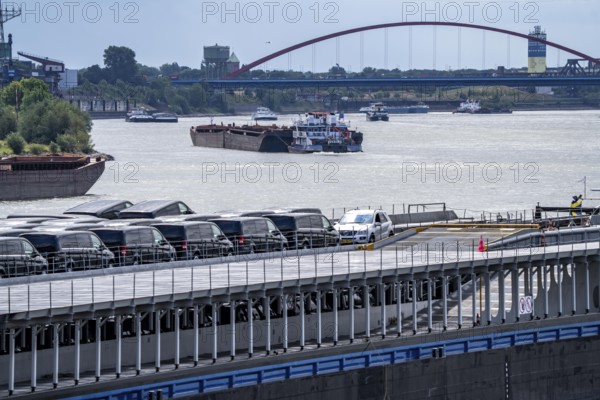 Cargo ships on the Rhine, in the background the Rhine bridge near Duisburg-Rheinhausen, Bridge of