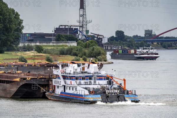 Cargo ships on the Rhine, in the background the Rhine bridge near Duisburg-Rheinhausen, Bridge of