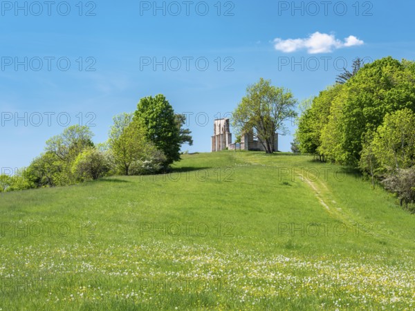 The ruins of St Catherine's Chapel, also known as Kappl, a pilgrimage church in a flowering meadow