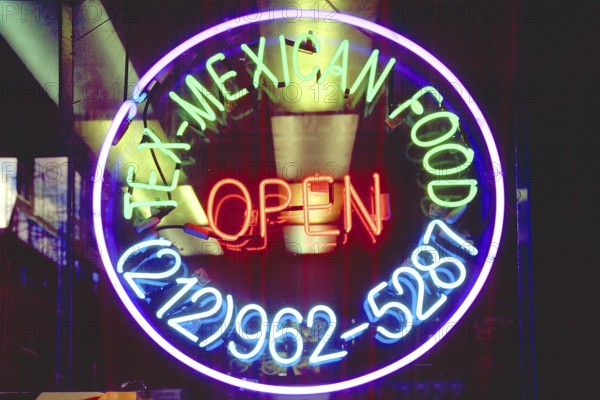 Illuminated advertising at a Mexican restaurant, Manhattan, New York City, USA