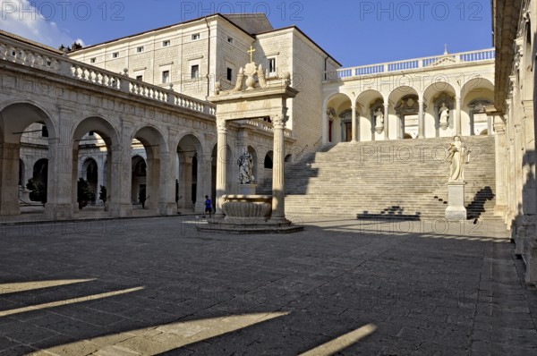 Bramante cloister with cistern and statues of St Benedict and St Scholastica of Nursia, Benedictine