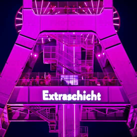 Illuminated headframe of the German Mining Museum with people, Extraschicht, Bochum, Ruhr area,