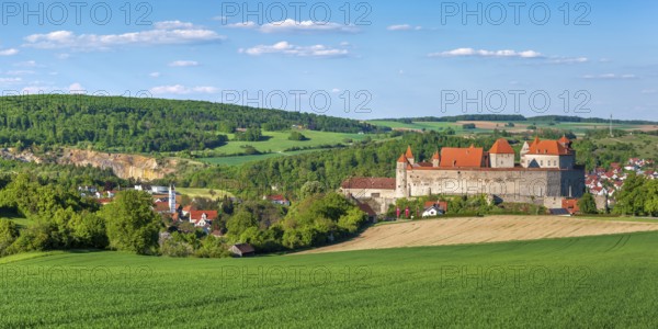 View over a green field to Harburg Castle, Donau-Ries, Swabia, Bavaria, Germany