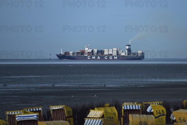 Large container ship... Elbe fairway through the Wadden Sea off Cuxhaven, North Sea, view from