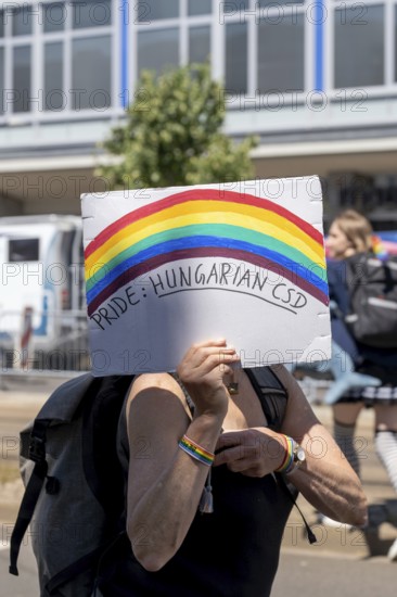 Participant with sign Pride: Hungarian CSD at Christopher Street Day in Leipzig on 28 June 2025.