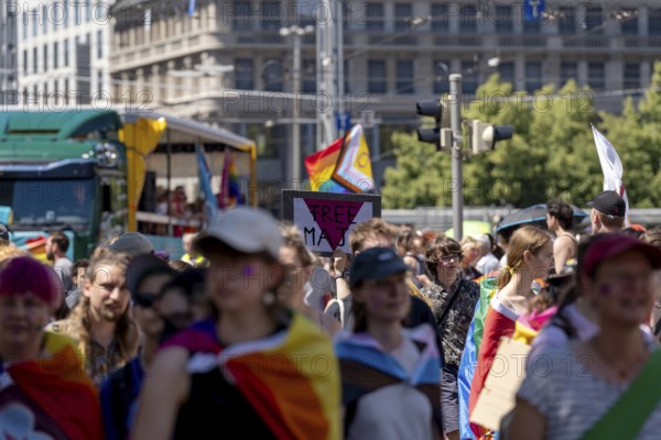 A participant with a Free Maja sign refers to Maja T., who is in custody in Budapest, Hungary, at