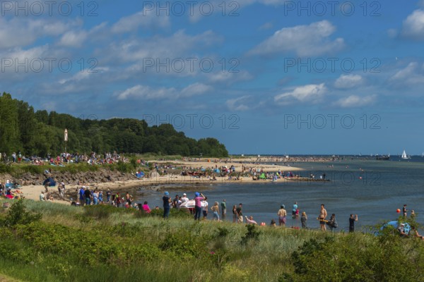Onlookers of the windjammer parade 2025 on the Kiel Fjord at the end of the Kieler Woche, sailors,
