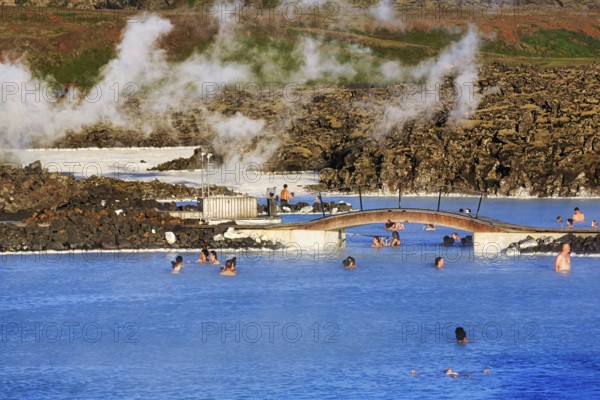 Tourists in thermal bath, outdoor pool, spa, BlÃ¡a LÃ³niÃ°, Blue Lagoon tourist attraction, hot