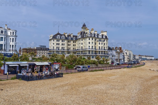 Beach and building on the seafront in Eastbourne, seaside resort on the English Channel, in the