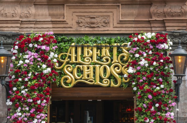Sign for Albert's Schloss, bar beer hall restaurant, Shaftesbury Avenue, central London, England,