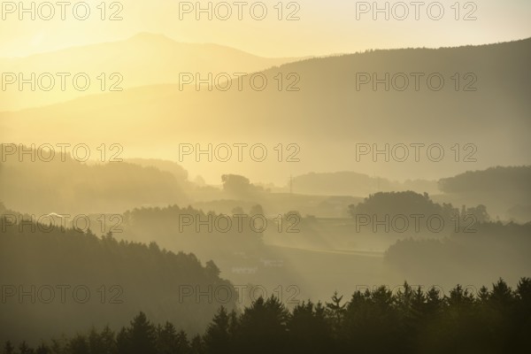 Landscape with forest, meadows and mountains around the town of Bad Kötzting, with a part of the
